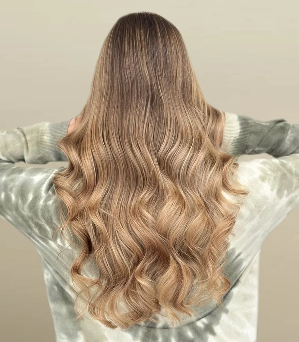 Balayage blond doré lumineux réalisé au salon La Paris'zen Institut Paris 14