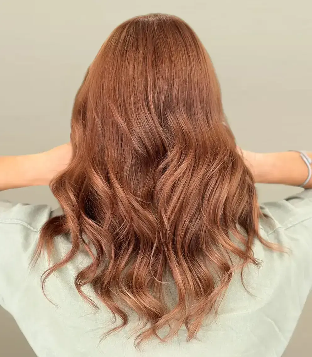 Coloration cheveux cuivrée brillante réalisée au salon La Paris'zen Institut Paris 14