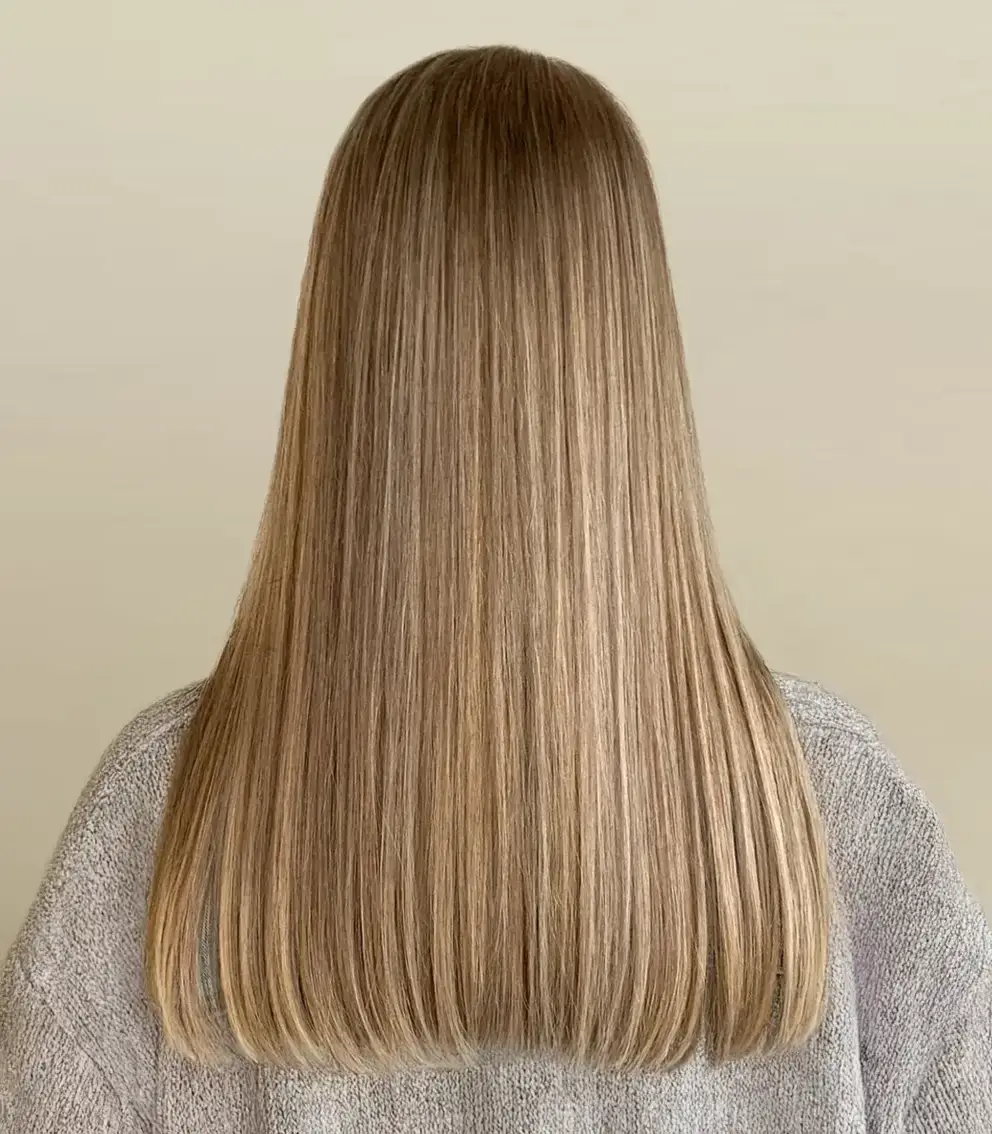 Lissage brésilien cheveux brillants réalisé au salon La Paris’zen Institut Paris 14